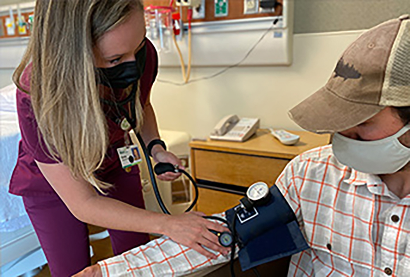 nurse taking blood pressure