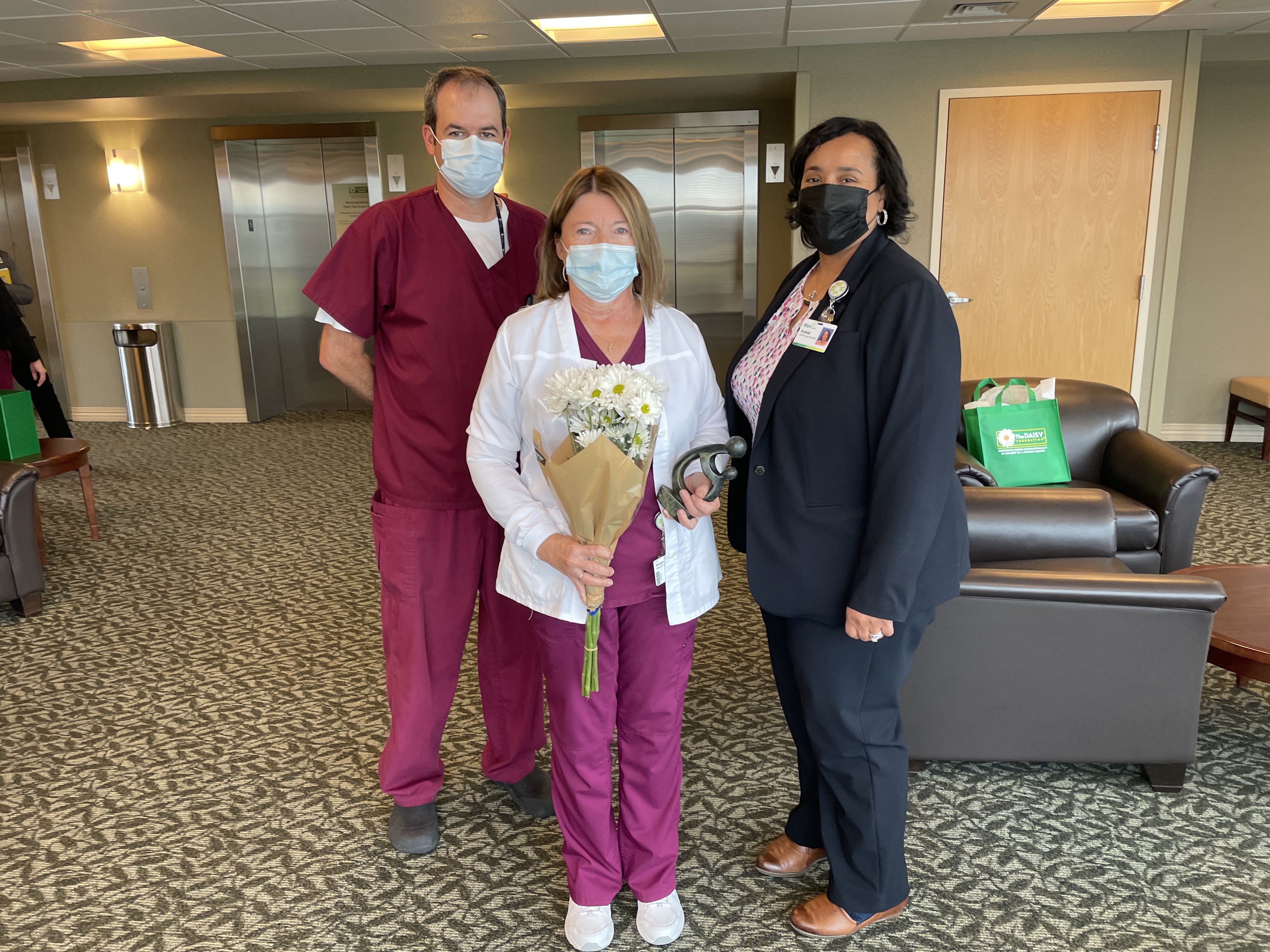 Nurses with flowers